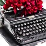typewriter with flowers